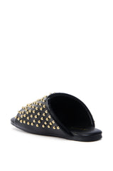 AKIRA BAGGER STUDDED SLIP ON SANDAL IN BLACK