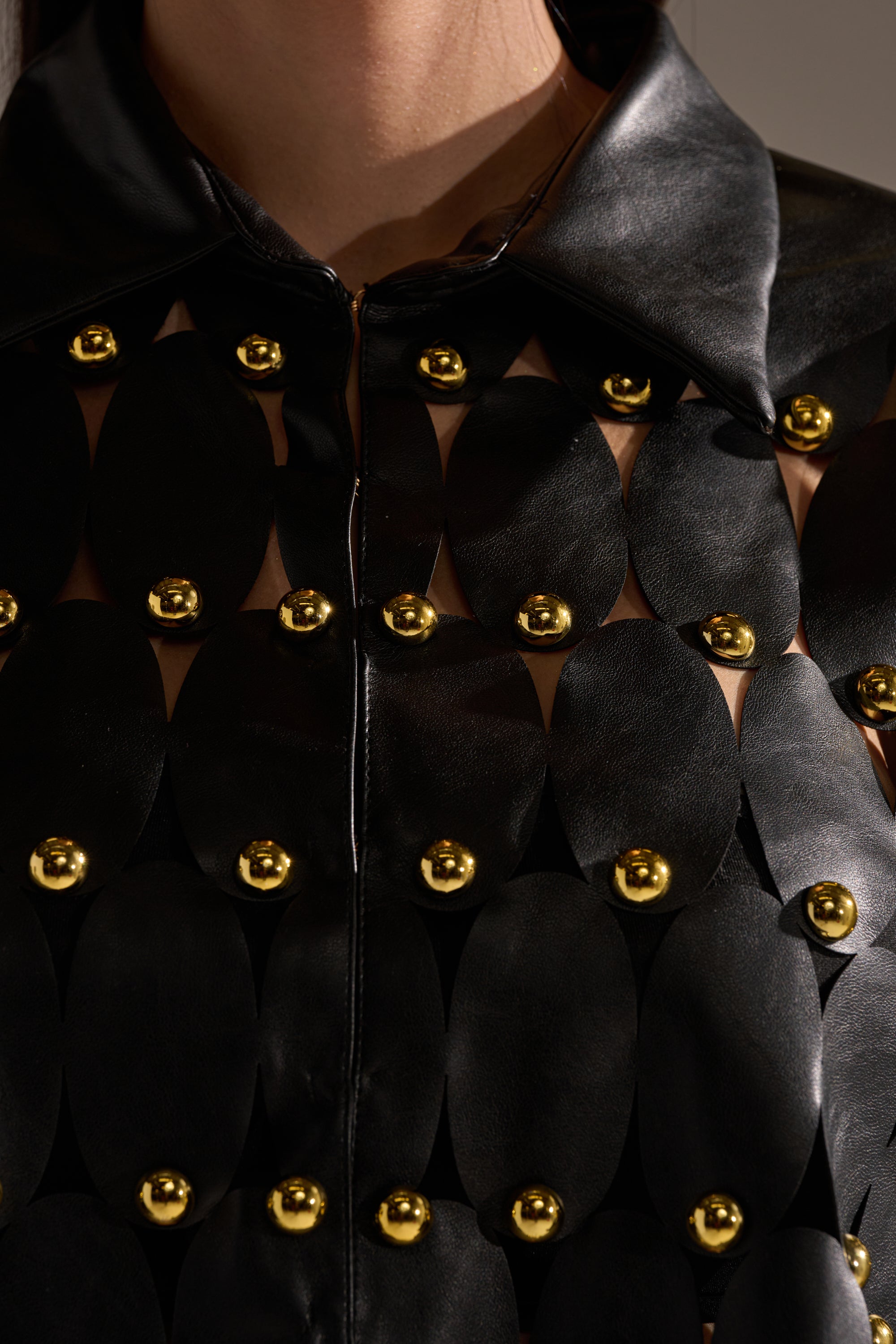 THE SNEAK PEEK STUDDED PU BLOUSE IN BLACK