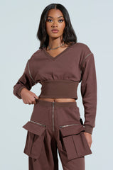 NIA CORSETED ZIPPERED LONGSLEEVE SWEATSHIRT