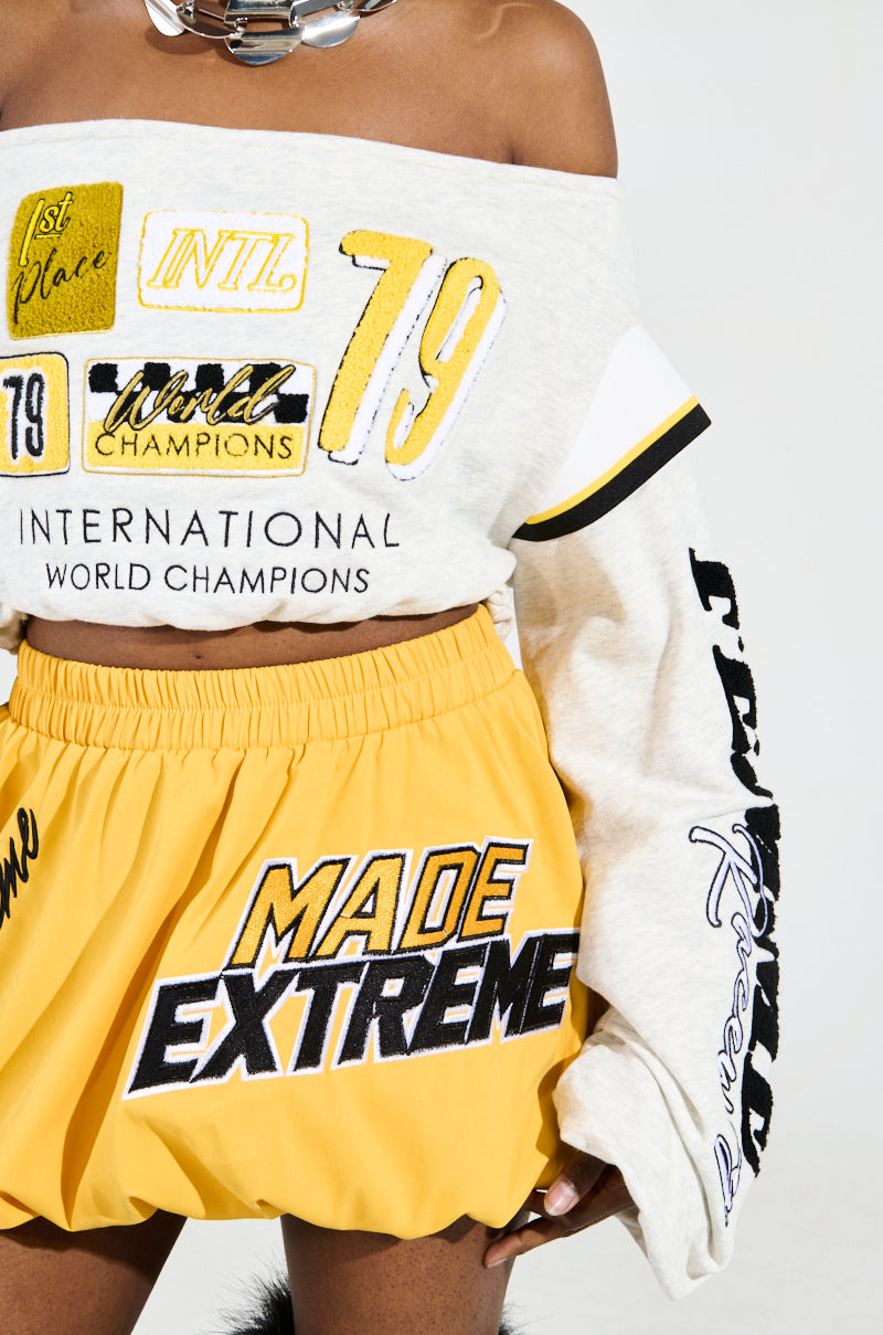 RACING THROUGH OFF THE SHOULDER SWEATSHIRT