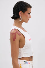 NEVER CARED DISTRESSED CROPPED TANK TOP