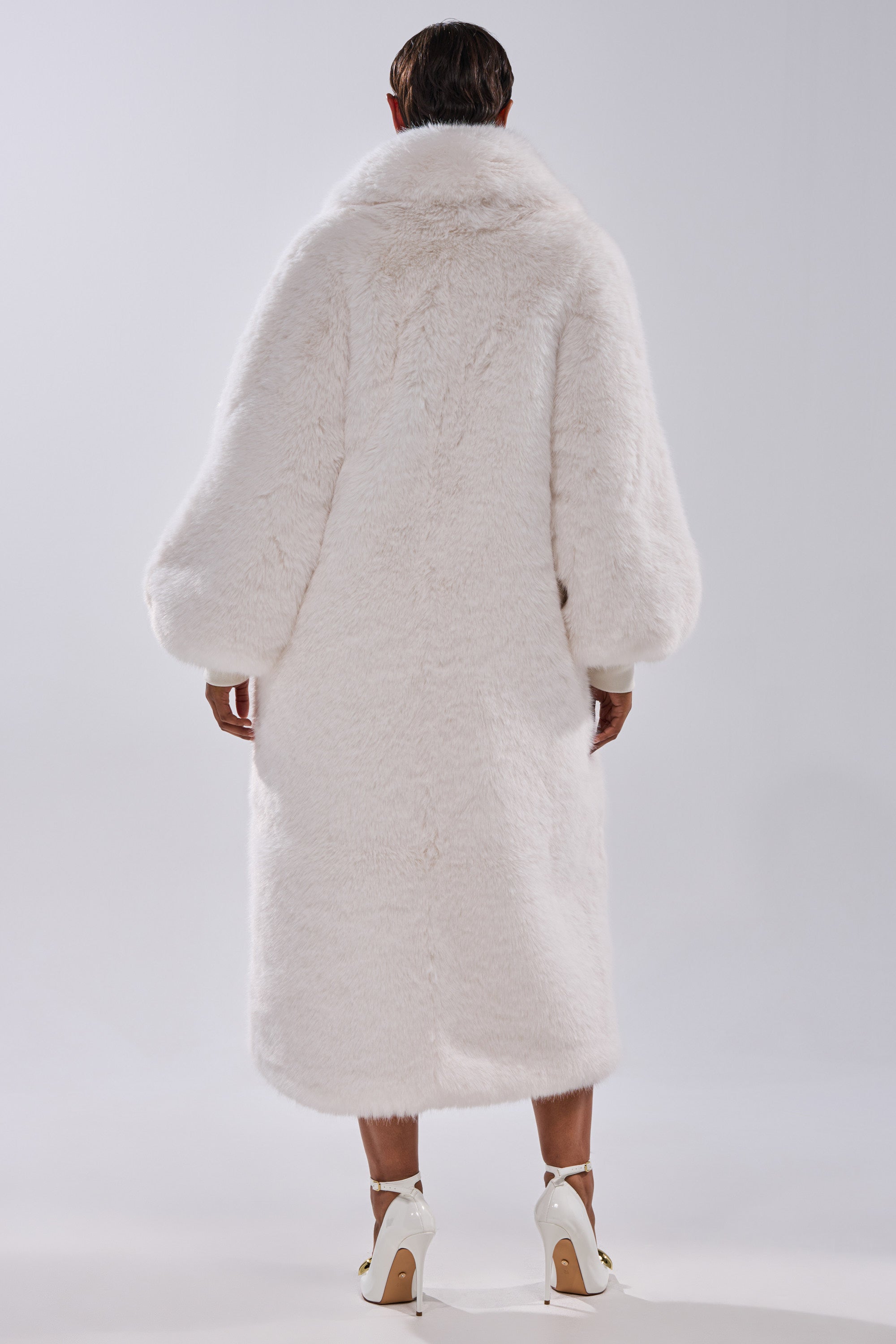 TSUNAMI FAUX FUR COAT IN WHITE